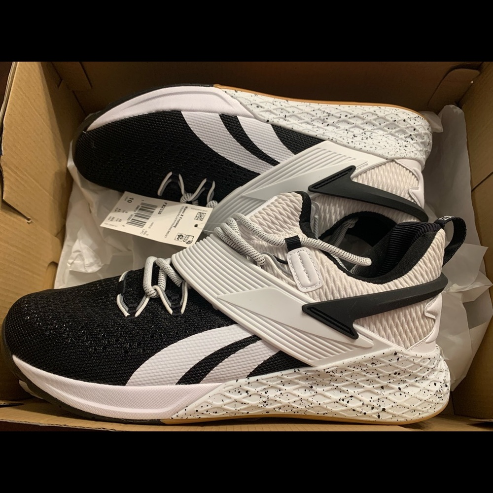 Men’s size 10 Reebok sneakers black & white